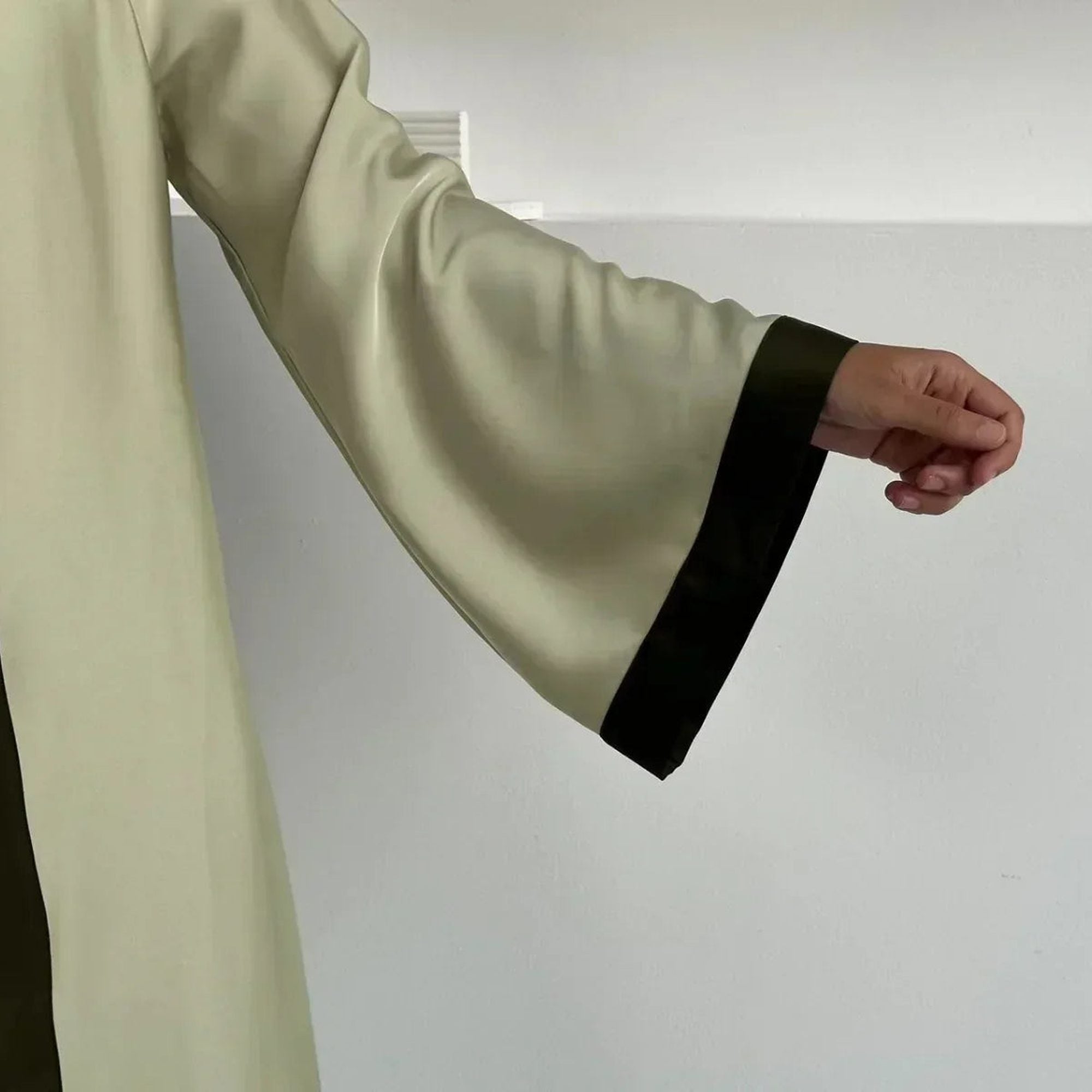 Elegant modest wear with wide sleeve and black trim from ZAHRA'S BEST