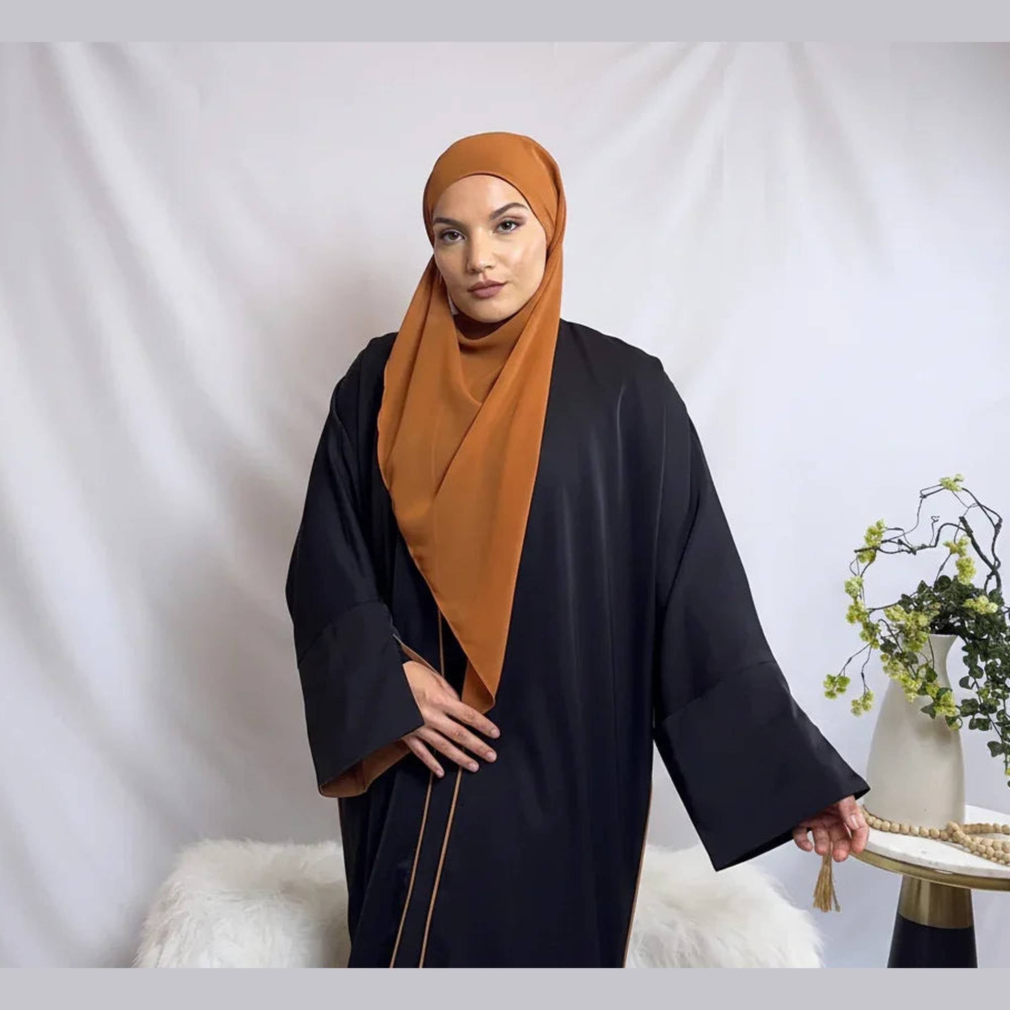 Elegant woman in brown hijab and black abaya, Zahra's Best modest fashion