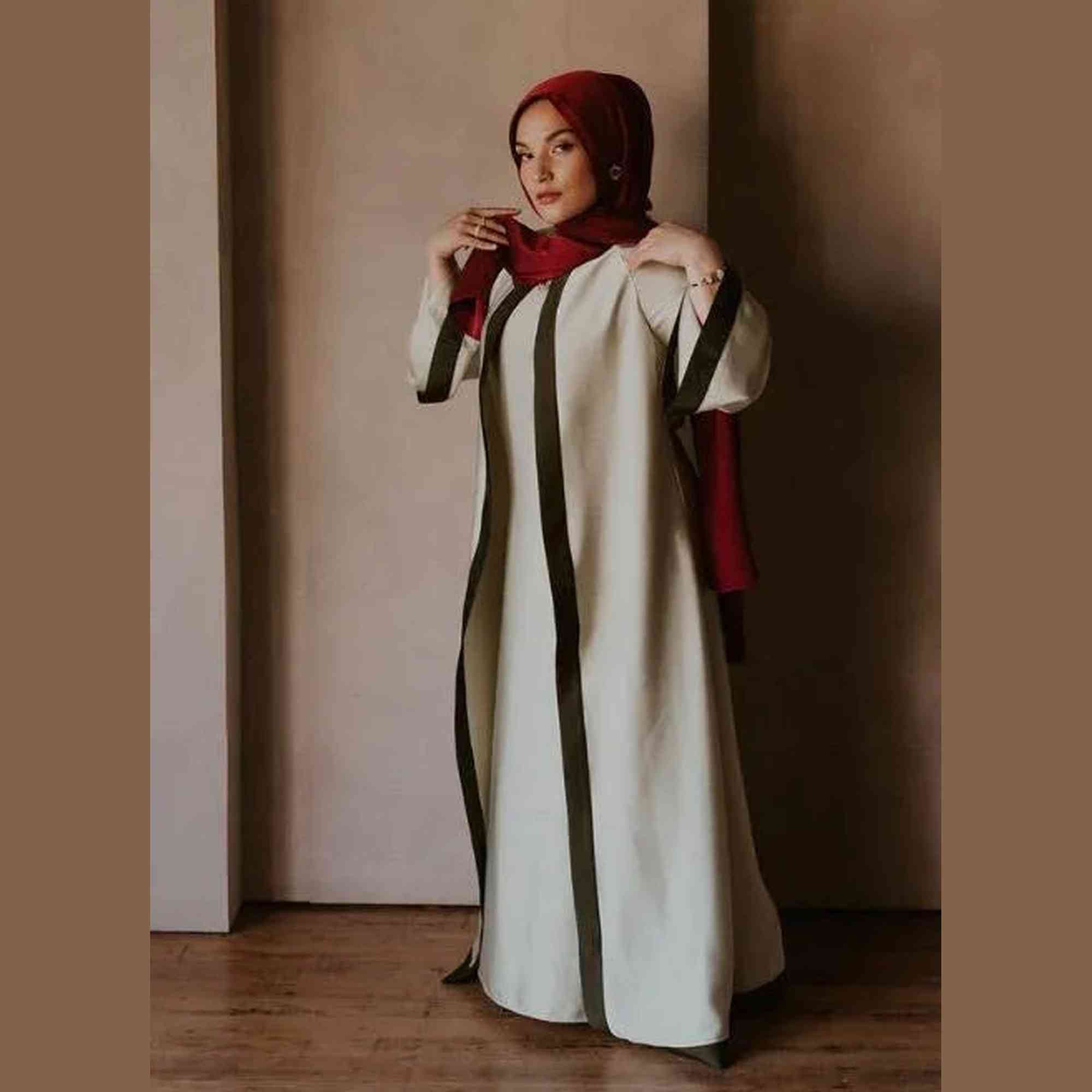 Woman in modest cream and olive abaya with red hijab, ZAHRA'S BEST modern modest wear