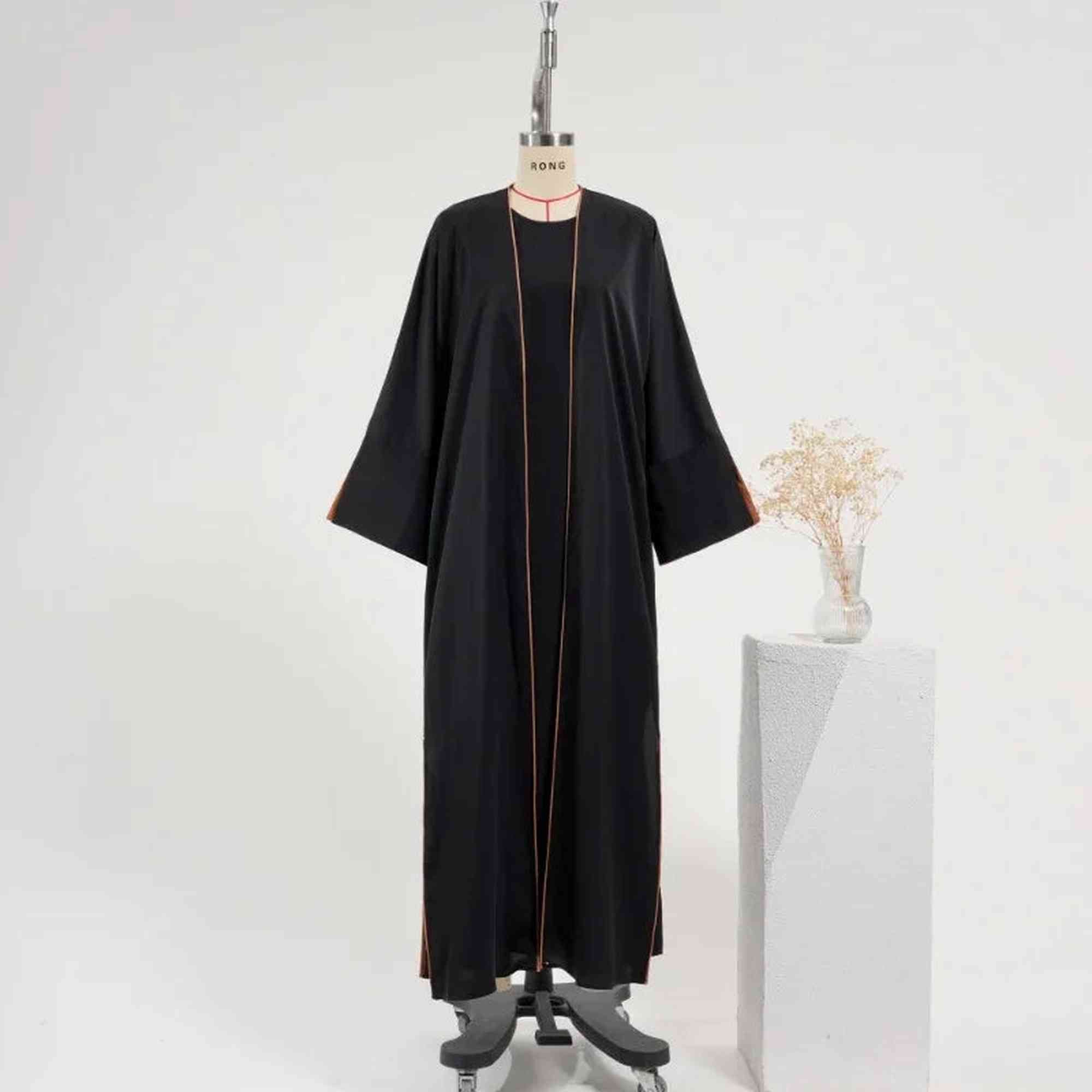 Elegant black modest abaya with brown trim on mannequin, ZAHRA'S BEST fashion