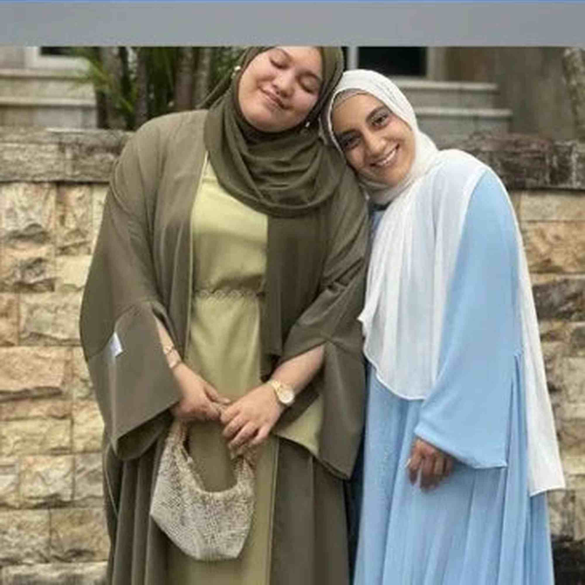 Two women in stylish modest dresses and hijabs, one in olive green, one in light blue - ZAHRA'S BEST